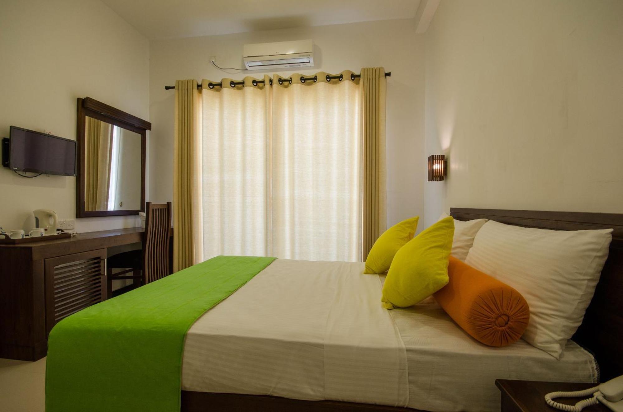 Okwin Resort Kandy Zimmer foto