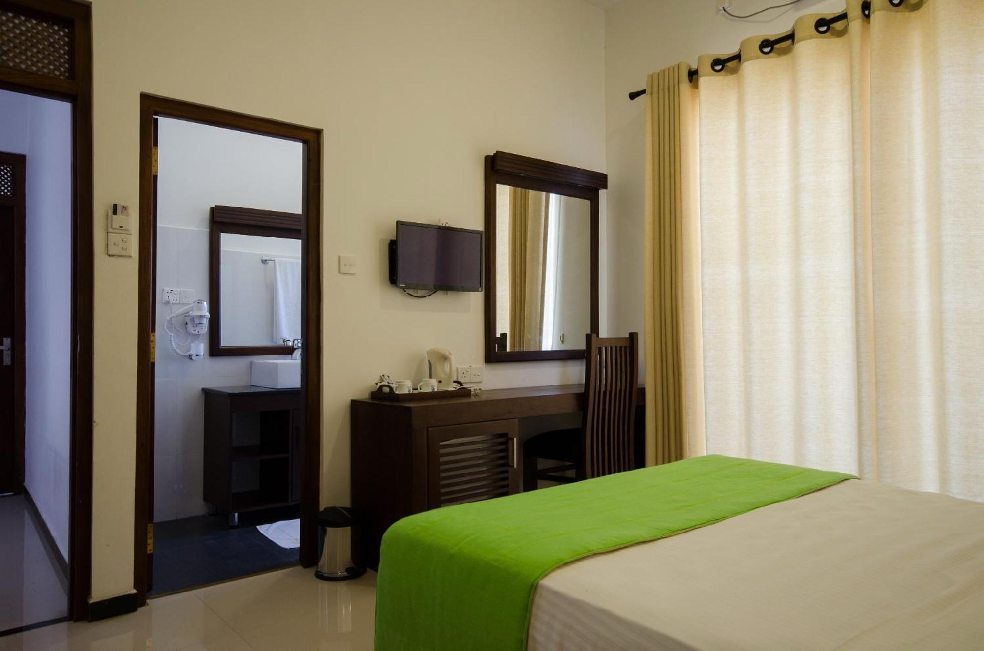 Okwin Resort Kandy Zimmer foto